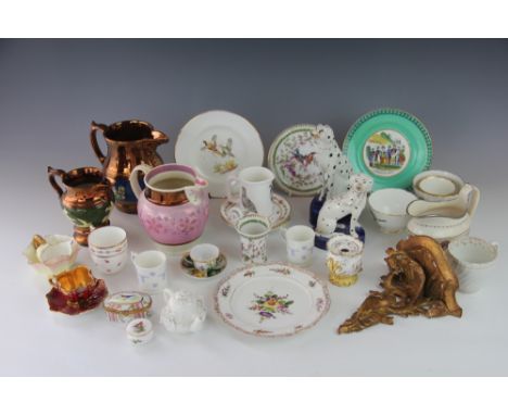 An assortment of ceramics, to include three lustre ware jugs, two Staffordshire dogs, a gilt decorated miniature Coalport tea