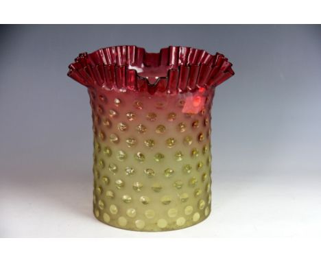 A rare Arts and Crafts glass oil lamp shade, in the manner of Webb, graduated ruby to yellow colour, moulded with dimples and