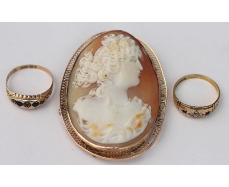 A carved shell cameo brooch within yellow metal surround, along with a 15ct yellow gold gypsy style ring and a 9ct yellow gol