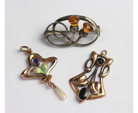 An Art Nouveau enamelled pendant stamped '9ct', suspending a freshwater pearl drop, along with a garnet set pendant also stam