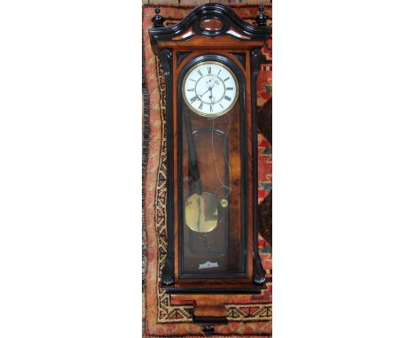 A Walnut Vienna regulator, with enamel Roman numeral dial, 110cm