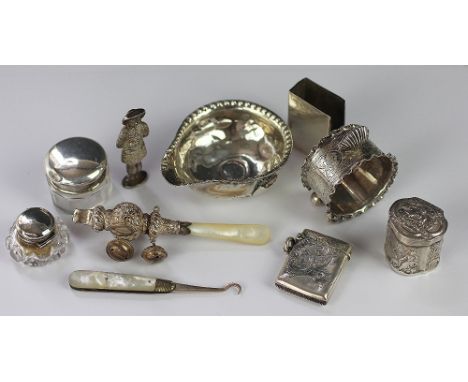 A collection of silver and white metal items, to include a silver napkin ring with shell finial, Brockington Brothers, Cheste