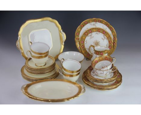 An Aynsley bone china thirty five piece part service, decorated with flowers against a gilt ground, with an Aynsley twenty fo