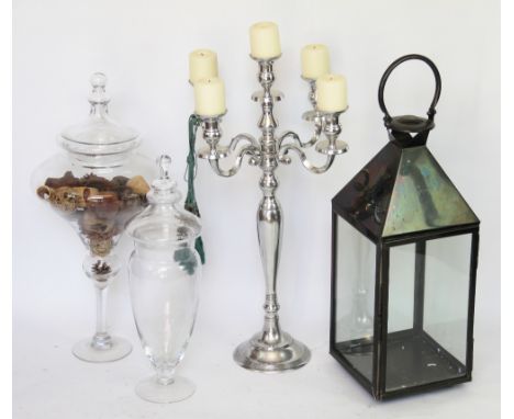 A modern bronzed metal garden lantern, 79cm, two large glass vases and covers, a modern five light candelabrum (4)