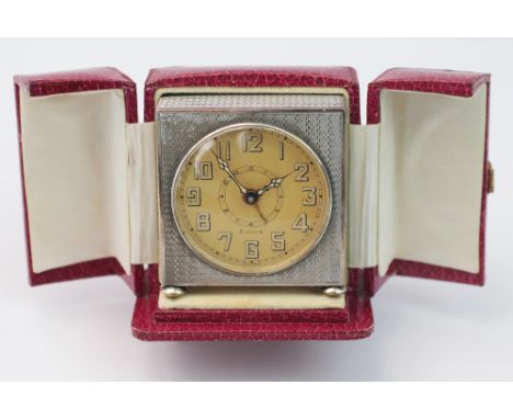 An Art Deco Selex travel / boudoir timepiece, with Swiss made movement, circular face, Arabic luminescent numerals and engine
