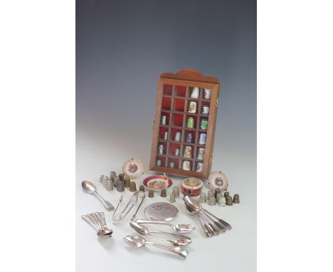 A collection of assorted thimbles, to include; seven silver examples, twelve assorted ceramic examples, assorted silver plate