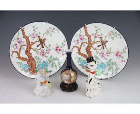 Two Mintons Bone china plates, decorated with birds, a tree and rockwork, a Staffordshire figural pen holder, a novelty potte