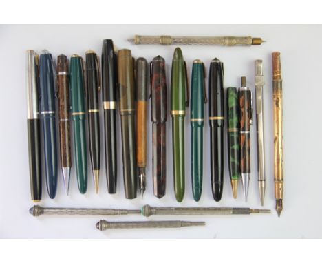 A collection of fountain pens and other pens, to include a Watermans Fountain pen with 14K nib, two Parker slimfold fountain 