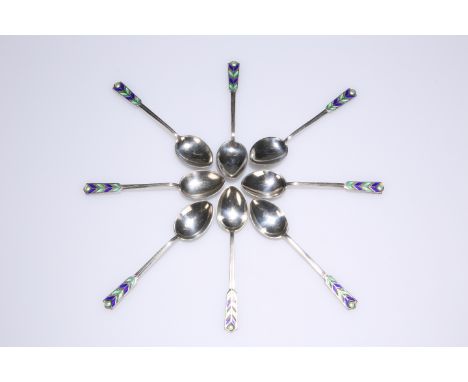 A SET OF EIGHT ART DECO SILVER AND ENAMEL COFFEE SPOONS, TURNER &amp; SIMPSON, BIRMINGHAM, 1936, each with blue and green ena