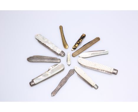 A LARGE COLLECTION OF FOLDING KNIVES, the vast majority fruit knives of silver and mother-of-pearl, including 9 carat gold mo