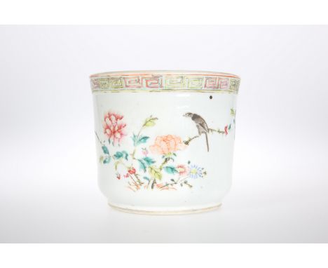 A CHINESE ENAMEL PAINTED FAMILLE ROSE CACHEPOT, 19TH CENTURY, painted with a typical floral spray, bird on a branch and insec
