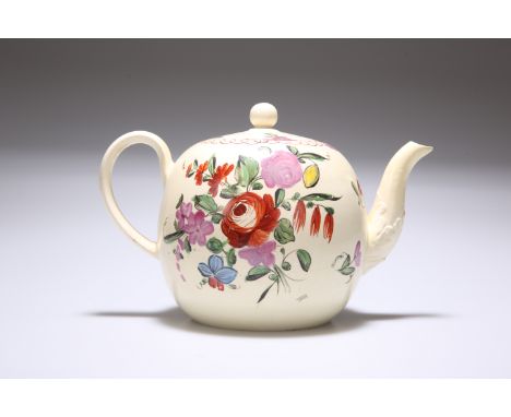 A LEEDS CREAMWARE TEAPOT, c. 1770/80, of globular form, painted with floral sprays, the spout moulded with acanthus. Length a