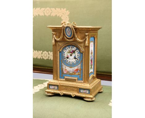 A FRENCH GILT-METAL AND PORCELAIN MOUNTED MANTEL CLOCK, LATE 19TH CENTURY, with Marti two-train movement striking the hours a