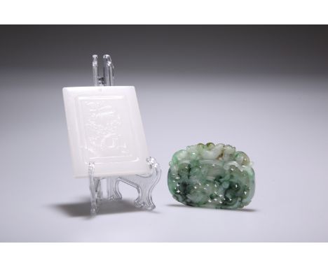 TWO CHINESE CARVED JADE PLAQUES, the first rectangular, carved with a dragon, 7.5cm by 6cm; the second pierced and carved wit