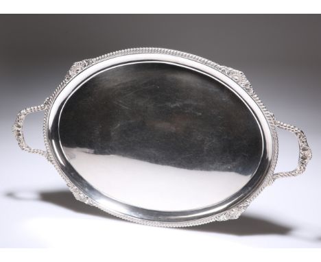 A VICTORIAN SILVER TRAY, BY LOWE AND SONS, CHESTER, 1898, shaped oval and with a shell and foliage heightened gadrooned borde