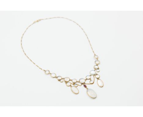 A LATE VICTORIAN MOONSTONE SET NECKLACE, the eleven graduating round cut moonstones set to the front of a fine link chain, su