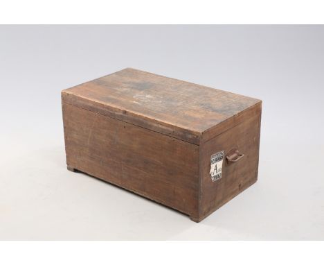 AN EARLY 20TH CENTURY TEAK CABIN TRUNK, with metal carrying handles, remnants of Henderson Line paper label for travel to Ran