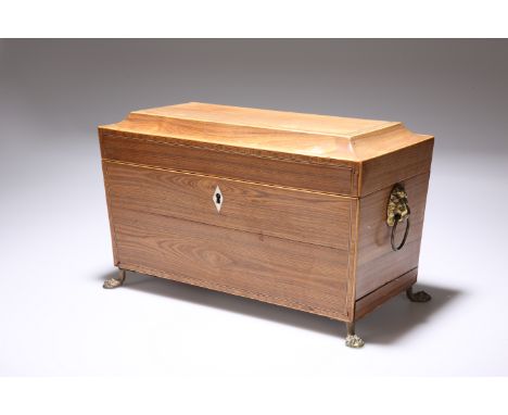 A REGENCY ROSEWOOD TEA CADDY, with strung caddy top opening to reveal an interior with twin lidded canisters and a glass bowl