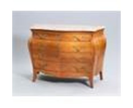 A LOUIS XV STYLE MARBLE TOPPED WALNUT BOMBE COMMODE, the serpentine marble top with moulded edge above four long drawers fitt