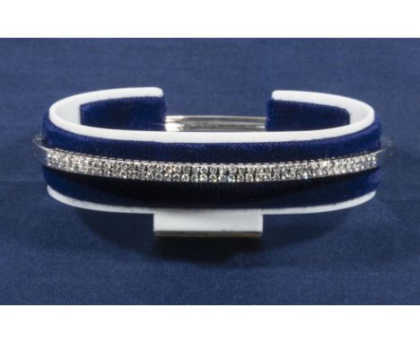 An 18ct white gold diamond bangle, 1 carat of diamonds