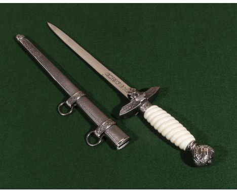 A reproduction German ceremonial dagger and scabbard