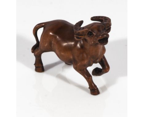 Hand carved hardwood netsuke of a water buffalo