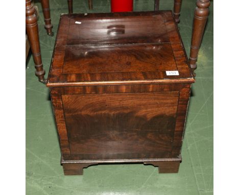 A Victorian lift top commode.