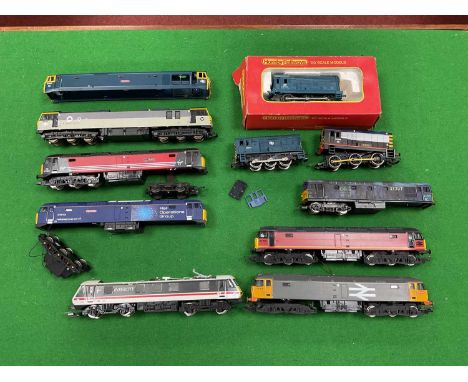 Approximately ten 00 gauge diesel and electric locomotives by Hornby and Lima for spares or repair.
