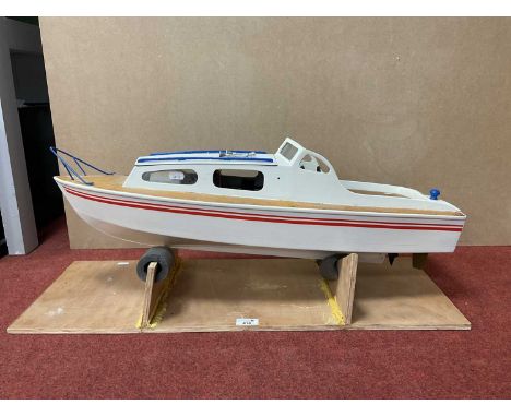 A Kit Built Wooden Construction Battery Operated Radio Control Model in the form of a Cruiser Boat. Features include Hitec Ba