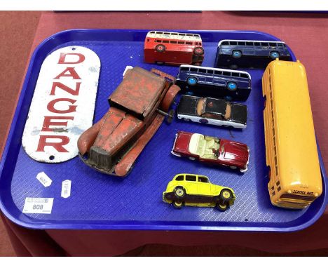 Seven Original Dinky Toys, including 'Waynes School Bus' (three repainted), a Mettoy tin plate clockwork car A/F and an ename