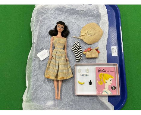A Circa 1960 Ponytail Barbie Doll Model 850. Soft Floss Hair Brunette, Poodle Curls and Ponytail, Blue Eyes, Light Brown Eyeb