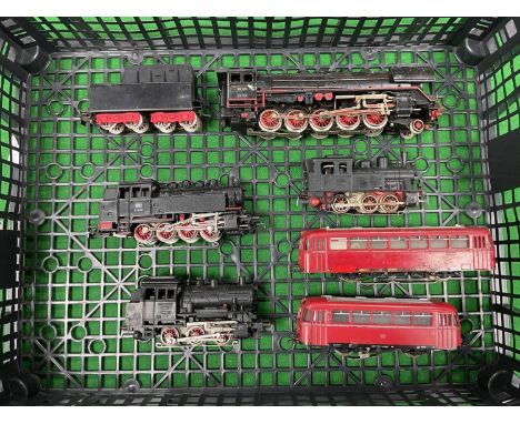 Four Marklin HO scale German steam locomotives including an 0-8-0 tank engine, two 0-6-0 tank engines and 44 class 2-10-0 and