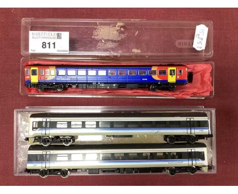 Two boxed N gauge diesel railcars: a Dapol Class 153 single unit in East Midlands livery (in a Minitrix box some couplings an
