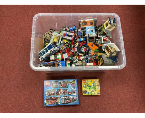 A Quantity of Mostly Loose and Partially Constructed Lego. Themes Include, Recovery Truck, Police Car, Sports Car, Aircraft, 