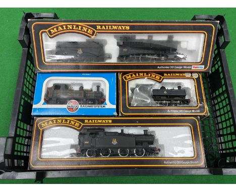 Four boxed 00 gauge ex-GWR locomotives: a Mainline 43xx 2-6-0, a Mainline 56xx 0-6-2T, and a Mainline 57xx 0-6-0PT all in BR 