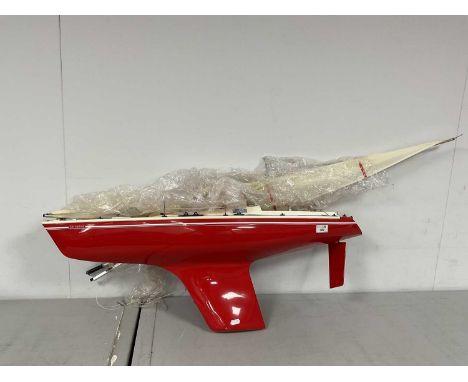 A Kyosho (Japan) Battery Operated Plastic and Wood Construction Radio Control Model Sailing Yacht 'Fairwind'. Featuring Futab