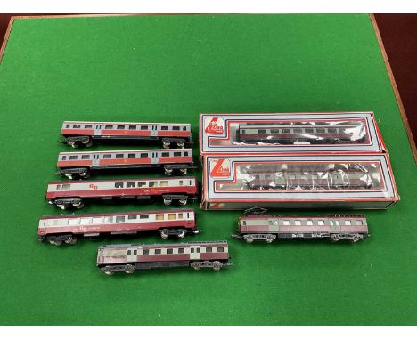 A Lima HO gauge South African electric suburban train comprising motor coach with pantograph, trailer car, boxed dummy motor 