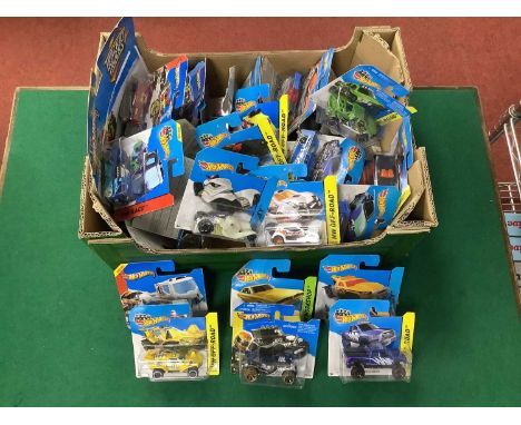 Approximately Thirty Five Mattel Hot Wheels Die Cast Model Vehicles. Mostly In Unopened Original Packaging.