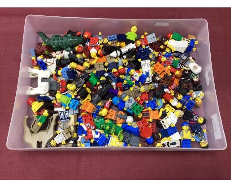Approximately One Hundred Lego Mini Figures, Animals, etc. Assorted Themes. Playworn, Small Parts May Be Missing.