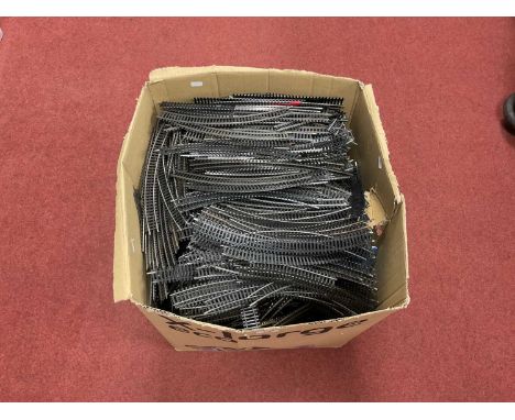 A large quantity of 00 gauge steel track by Hornby, Lima and others.