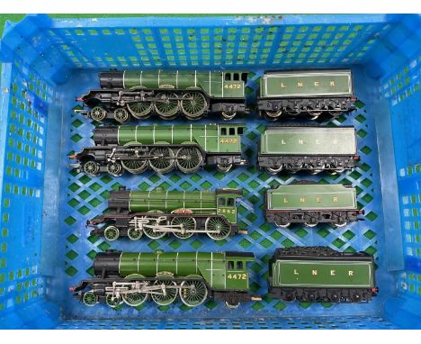 Four Hornby 00 gauge LNER locomotives: three "Flying Scotsman" 4-6-2s and a B17 4-6-0 "Manchester United", all playworn in LN