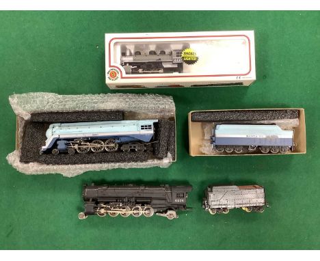 Three HO scale American steam locomotives: a Rivarossi Santa Fe "Blue Goose" 4-6-4 no 3460 and tender; a Rivarossi 2-10-2 wit