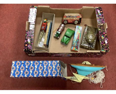 A Quantity Of Mid 20th Century Toys, Including a Scalextric Yacht Boxed, A Minic Dust Cart, A Japanese Tin Plate Tank, and Ot