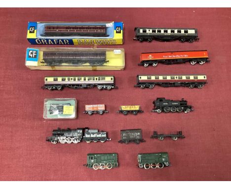 A quantity of British N gauge locomotives and rolling stock mostly by Graham Farish comprising: two 0-6-0 diesel shunters, an