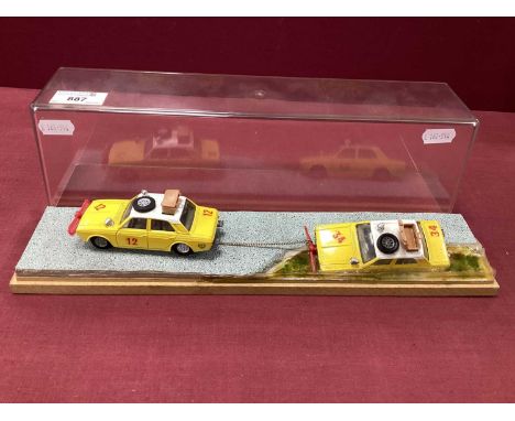 A Rally 1:43 Diarama Based on Two Original Corgi Hillman Hunters, in presentation case.