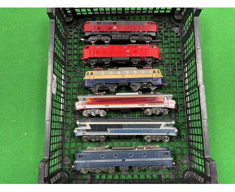 Six HO scale European diesel and electric locomotives by Lima, Fleischmann, Joueff and others including two DB Bo-Bo diesels;