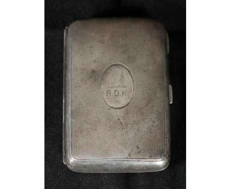A LATE VICTORIAN SILVER CIGAR CASE by Matthew John Jessop, London 1896, with curved engine turned body, engraved oval cartouc