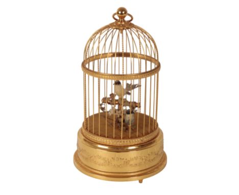 REUGE: A MODERN SWISS MADE AUTOMATON SINGING BIRD CAGE the base stamped "Sainte-Croix Made in Switzerland", and numbered " 43