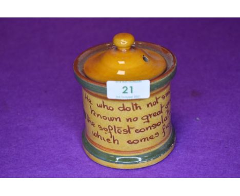 A vintage Cornish ware style ceramic smokers tobacco jar with motto inscribed