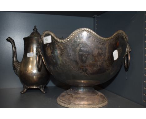 A large silver plated footed champagne or ice bucket by G H Hulley with twin lion head handles